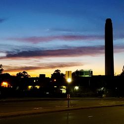 Silhouette of city at sunset