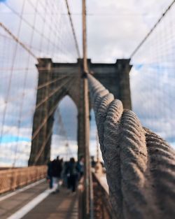 Bridge against sky in city