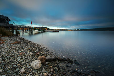 Scenic view of bay against sky