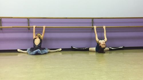 Woman sitting on stage