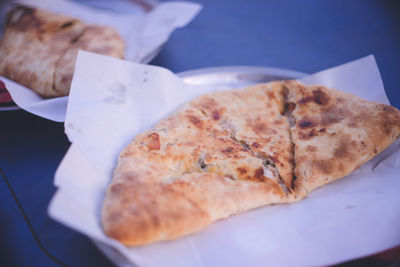 High angle view of pizza in plate on table