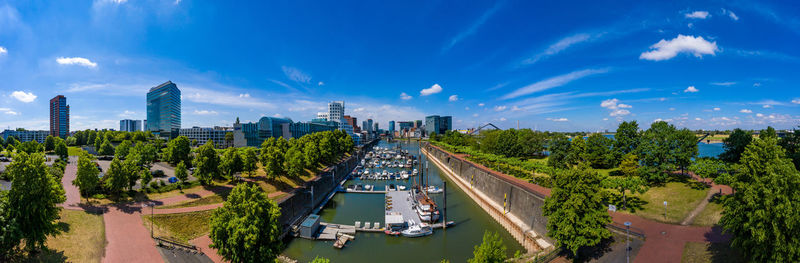 High angle view of modern buildings against sky