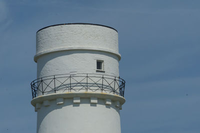 Low angle view of water tower against sky