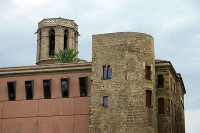 Low angle view of historic building against sky