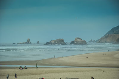 Scenic view of beach against clear sky