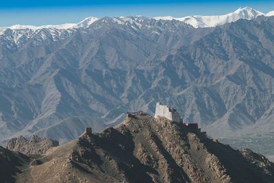 Scenic view of snowcapped mountains against sky