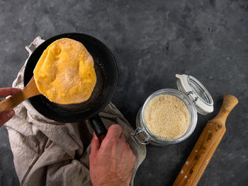 High angle view of person preparing food