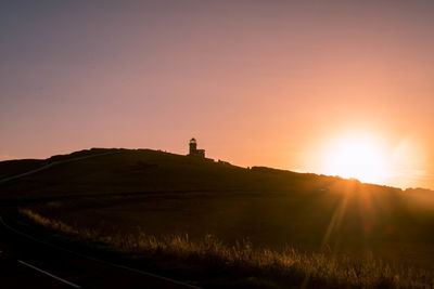 Scenic view of landscape against sky during sunset