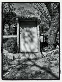 Old built structure with trees in background