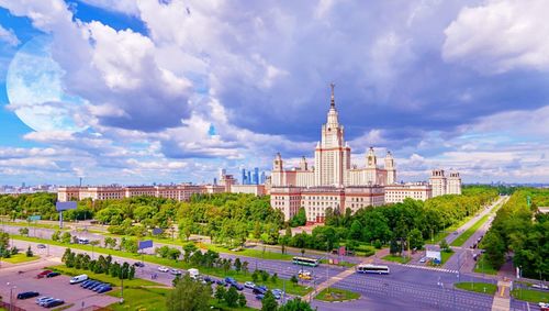 Panoramic aerial view of sunny and cloudy campus of moscow university in summer