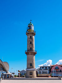 Low angle view of building against blue sky