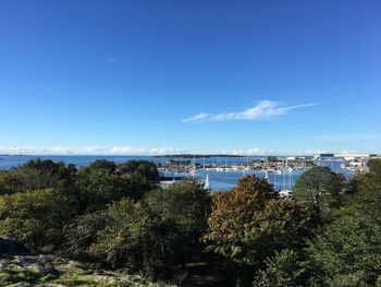 Scenic view of sea against blue sky