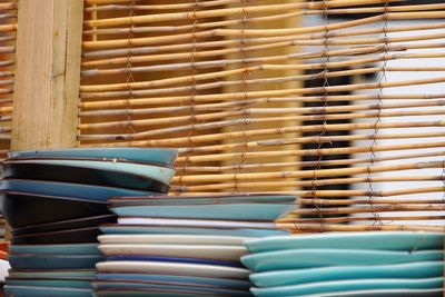 Stack of crockery by window