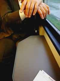 Close-up of man holding camera