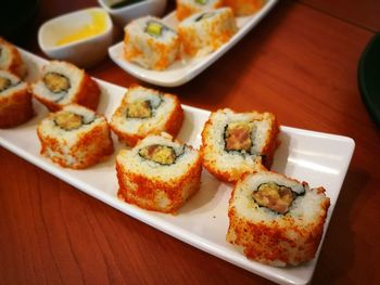 High angle view of sushi served on table