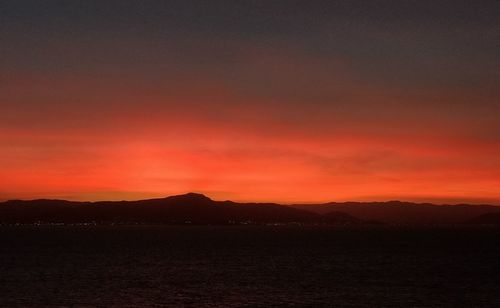 Scenic view of dramatic sky during sunset