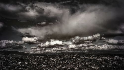 Storm clouds over land