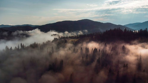 Scenic view of mountains against sky during sunset