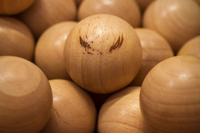 Close-up of wooden ball and textured like the eyebrow.
