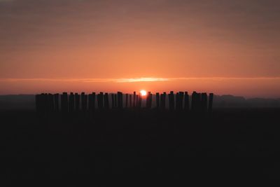 Scenic view of silhouette landscape against sky during sunset