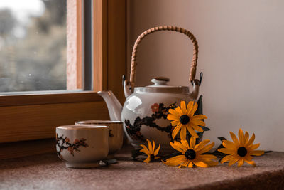 Close-up of teapot on table