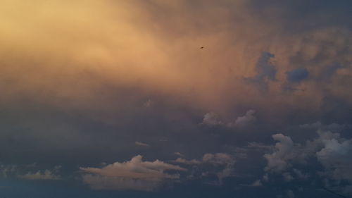 Low angle view of clouds in sky during sunset