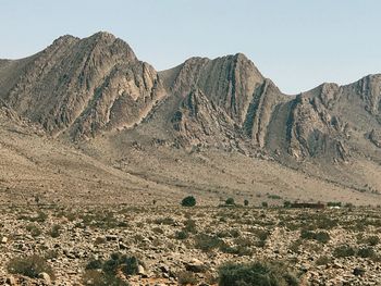 Scenic view of rocky mountains against clear sky