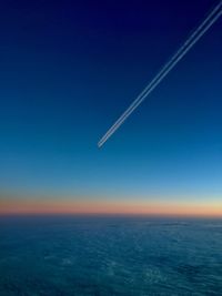 Aerial view of vapor trails in sky