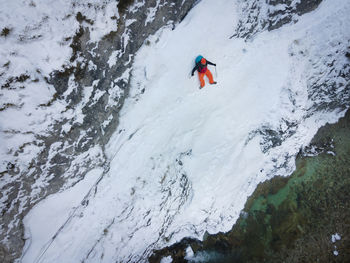 High angle view of person skiing on snow