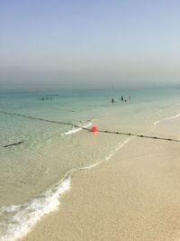 Scenic view of beach against clear sky