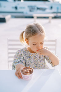 Portrait of cute girl looking away