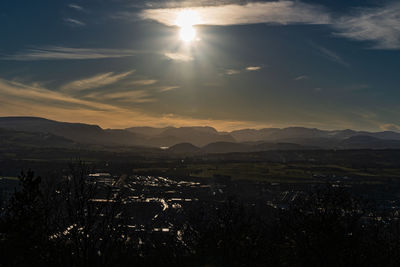 Scenic view of mountains against sky during sunset