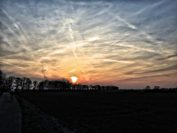 Scenic view of landscape at sunset