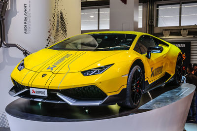 Yellow car parked in field