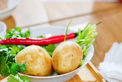 Close-up of fruits in plate on table