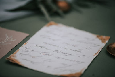 High angle view of paper on table