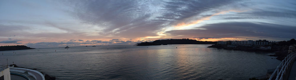 Scenic view of sea against sky at sunset