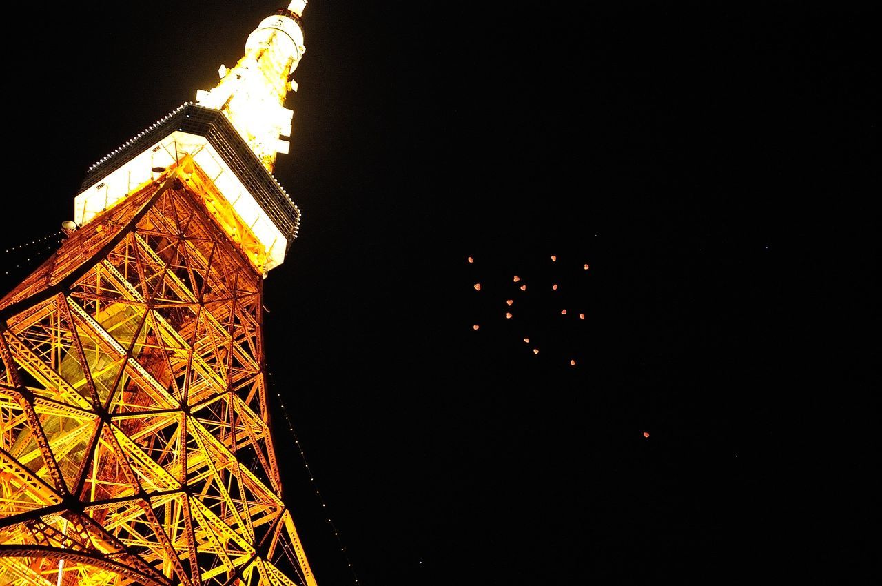 night, illuminated, low angle view, building exterior, built structure, architecture, clear sky, copy space, lighting equipment, dark, sky, no people, street light, outdoors, religion, glowing, lantern, high section, celebration