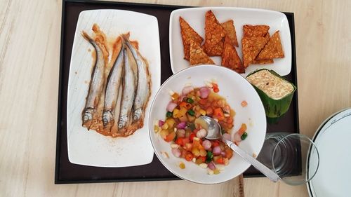 High angle view of food served on table