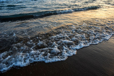 High angle view of sea shore during sunset