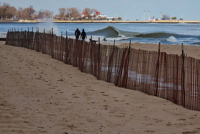 People standing on pier