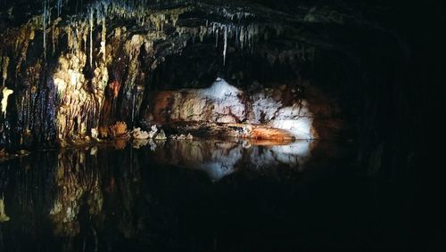 Reflection of rock in water