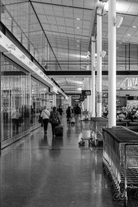 People walking in airport building