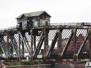 Bridge over water against sky