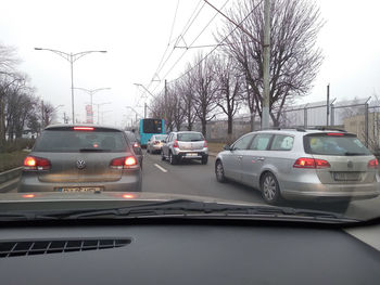 Cars on road in city