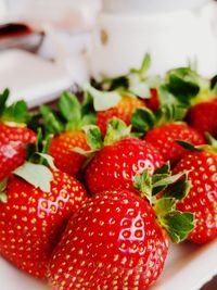 Close-up of chopped strawberries in plate