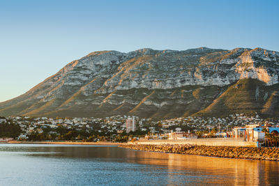 Scenic view of montgó natural park from marina dénia port in alicante, spain 