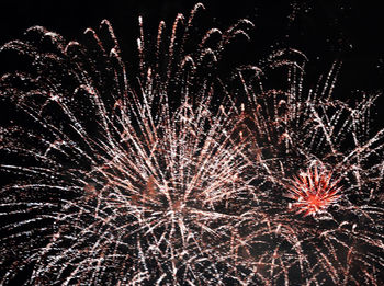 Firework display at night