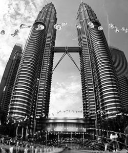 Low angle view of modern buildings against sky