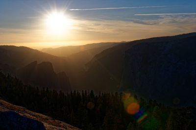 Scenic view of mountains against sky during sunset